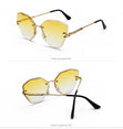 Vintage Alloy Frame Classic Lady Rimless Sun glasses